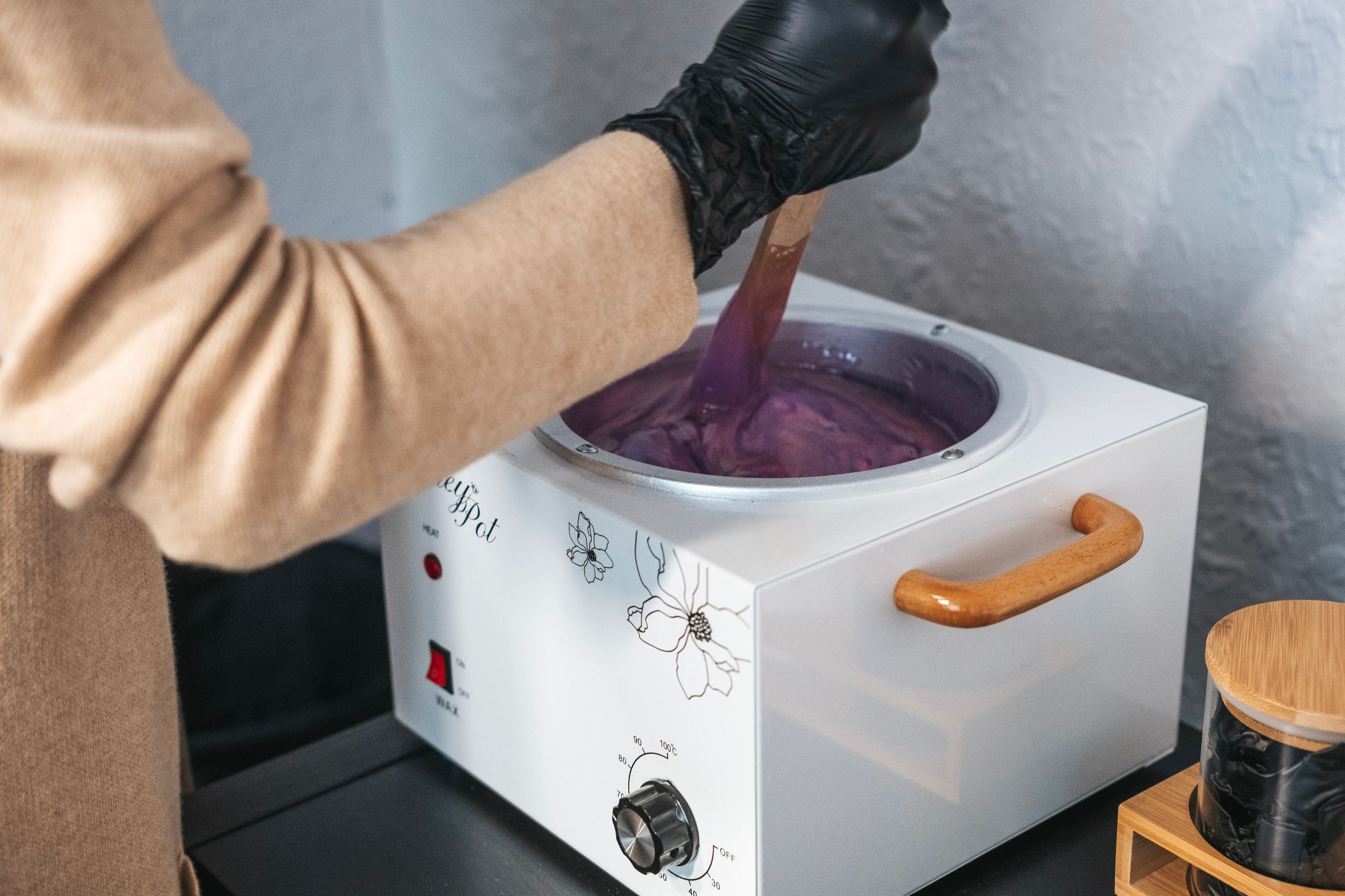 Premium hard wax being prepared in the studio